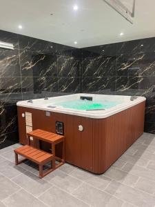 Appartements Piscine & Spa : photos des chambres