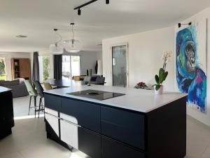 Villas Superbe villa de plain pied avec piscine et jardin : photos des chambres