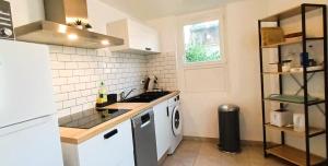 Maisons de vacances La Cachette - Maisonnette - Wifi - TV : photos des chambres