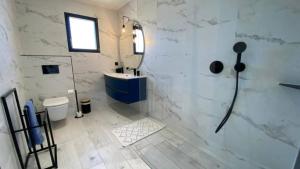 Villas Escapade Marine piscine et spa pour 10 : photos des chambres