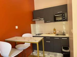 Appartements Charmant studio equipe : photos des chambres