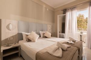 Standard Triple Studio room in Capriccio Studios