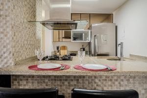 Flat com Limpeza Diária, Piscina e Praia - DL1804