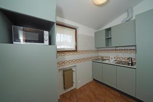 Two-Bedroom Apartment Plus with Partial Lake View room in Appartamenti Arca & Ca' Mure