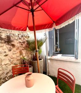 Appartements La Loge des Remparts : photos des chambres