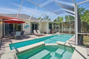 Walk to Vanderbilt Beach & Relax in the Pool