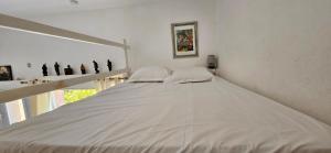 Appartements T1 Pinedda, Studio confort-Vue mer- Calme & soleil : photos des chambres