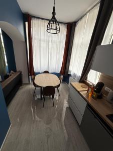 Appartements F3 centre-ville, parking prive : photos des chambres
