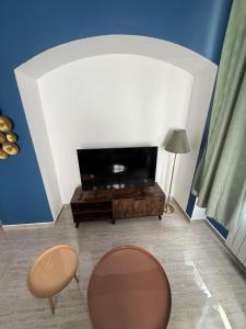 Appartements F3 centre-ville, parking prive : photos des chambres