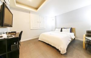 비즈니스 더블룸 침대