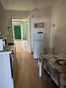 Appartamento Morelli Beach - Via Giacomelli 55