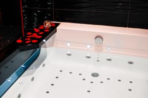 Appartements Le Love Spa : photos des chambres