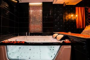 Appartements Le Love Spa : photos des chambres