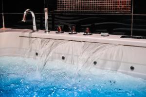 Appartements Le Love Spa : photos des chambres