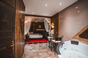Appartements Le Love Spa : photos des chambres