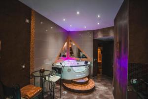 Appartements Le Love Spa : photos des chambres
