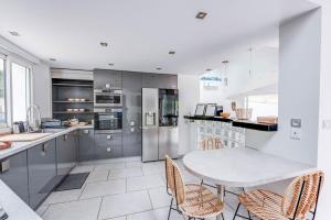 Villas Villa Djun Hossegor 4 etoiles, piscine, 12 personnes : photos des chambres