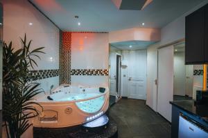 Appartements Le Love Spa : photos des chambres