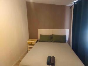 Appartements Logement avec exterieur : photos des chambres