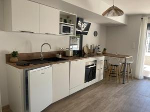 2 appartement RDC avec extérieur