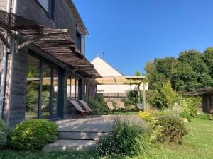 Maisons de vacances Maison en bois a la campagne proche vilaine : photos des chambres