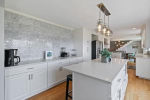 Luxury Water View 6BR Retreat with Hot Tub and Gym