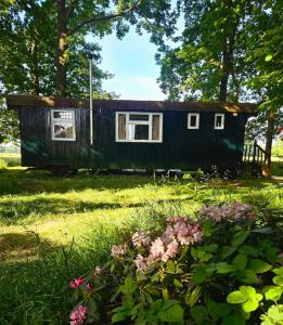 Pipowagen Bijzonder Buitenaf met jacuzzi en sauna