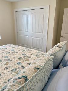 Penthouse on the beach - penthouse balcony and ocean views bay breeze sleeps 8 comfortably