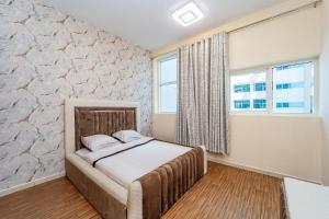 Luxury 2 bedroom next to beach with swimming pool gym and kids play area