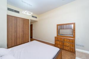 Luxury 2 bedroom next to beach with swimming pool gym and kids play area