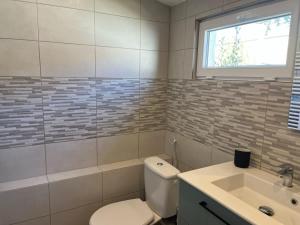 Maisons de vacances Charming house with garden, center of Puilboreau : photos des chambres