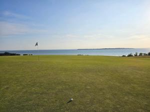 Modern Cottage with Deck in Sandskogen