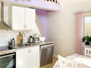 Charming Garden Cottage in Levide