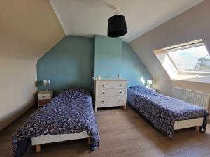 Maisons de vacances Holiday Home in Paimpol near Beach, cleaning included : photos des chambres