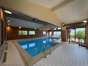 Appartements Appartement 4 pieces avec piscine couverte a Combloux - FR-1-560-127 : photos des chambres