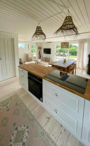 Southern Flair In Modern Danish Summer House