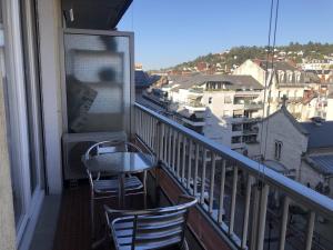 Appartements Studio 25 m2 Le Jasmin centre-ville, parking et balcon : photos des chambres