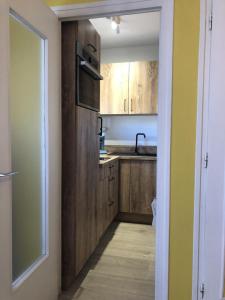 Appartements Studio 25 m2 Le Jasmin centre-ville, parking et balcon : photos des chambres