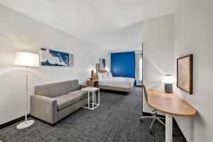 King Room with Sofa room in Country Inn & Suites by Radisson Fayetteville-Fort Bragg NC