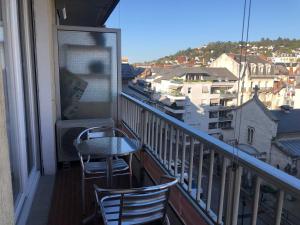 Appartements Studio 25 m2 Le Jasmin centre-ville, parking et balcon : photos des chambres