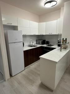 Apartment Garden - two large terraces with hanging chairs and sunset view