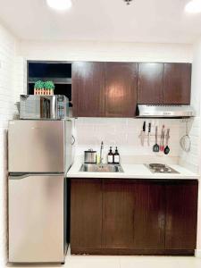 2BR Condo w Pool Loft at Fort Victoria BGC Taguig