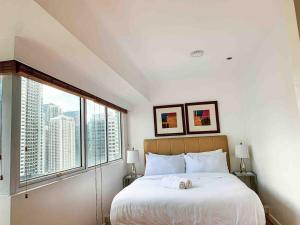 2BR Condo w Pool Loft at Fort Victoria BGC Taguig