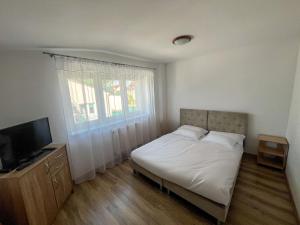 Pokoje i apartamenty Pod Dębem