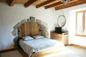 Chalets Chaleureuse maison de village : photos des chambres