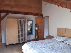 Chalets Chaleureuse maison de village : photos des chambres