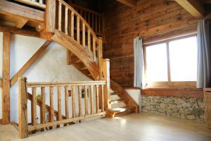 Chalets Chaleureuse maison de village : photos des chambres