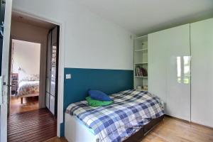 Maisons de vacances House with garden RER & Metro line 1 to 5 min : photos des chambres