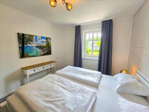 Dünenpark Binz - Komfortplus Ferienwohnung mit 1 Schlafzimmer und Balkon im Obergeschoss 204