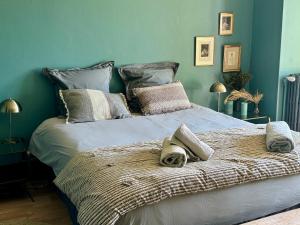 Maisons de vacances Maison en pierre, charme et jardin au calme : photos des chambres